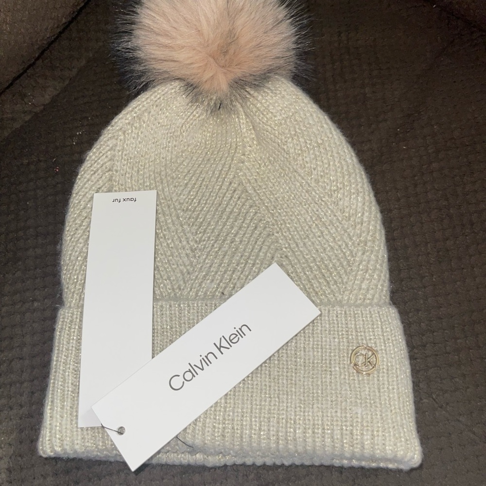 Calvin Klein cream glitter, pom-pom beanie, brand new with tag still attached